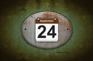 Old wooden calendar with September 24.